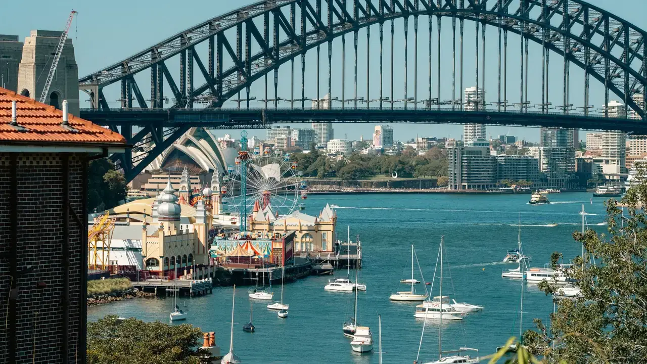 Sydney Harbour Bridge, Luna Park and sailboats on the harbour